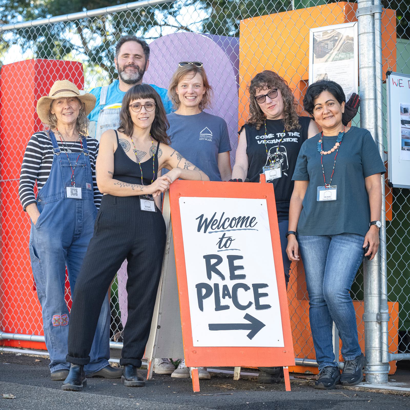 Re Place volunteers at the Re Place entrance